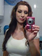 Amateur redhead Vica taking naked selfies in the bathroom