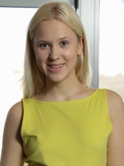 Beautiful blonde teen Nikki Hill  strips off her bodysuit in the bedroom