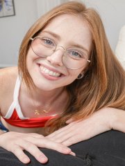 Redhead amateur Lucy Foxx gets fucked POV style on the couch