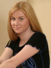 Beautiful blonde teen Irina strips and masturbates on the couch