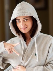 Busty amateur Taylor Vixen peels off her grey hoodie in the living room