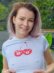 Skinny babe Polly White toying her shaved pussy after a dip in the pool