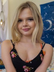 Blonde amateur Coco Lovelock strips down to her high heels in the bedroom